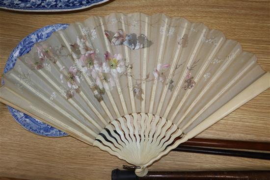 A boxed ivory fan, three other fans and a quantity of ladys gloves
